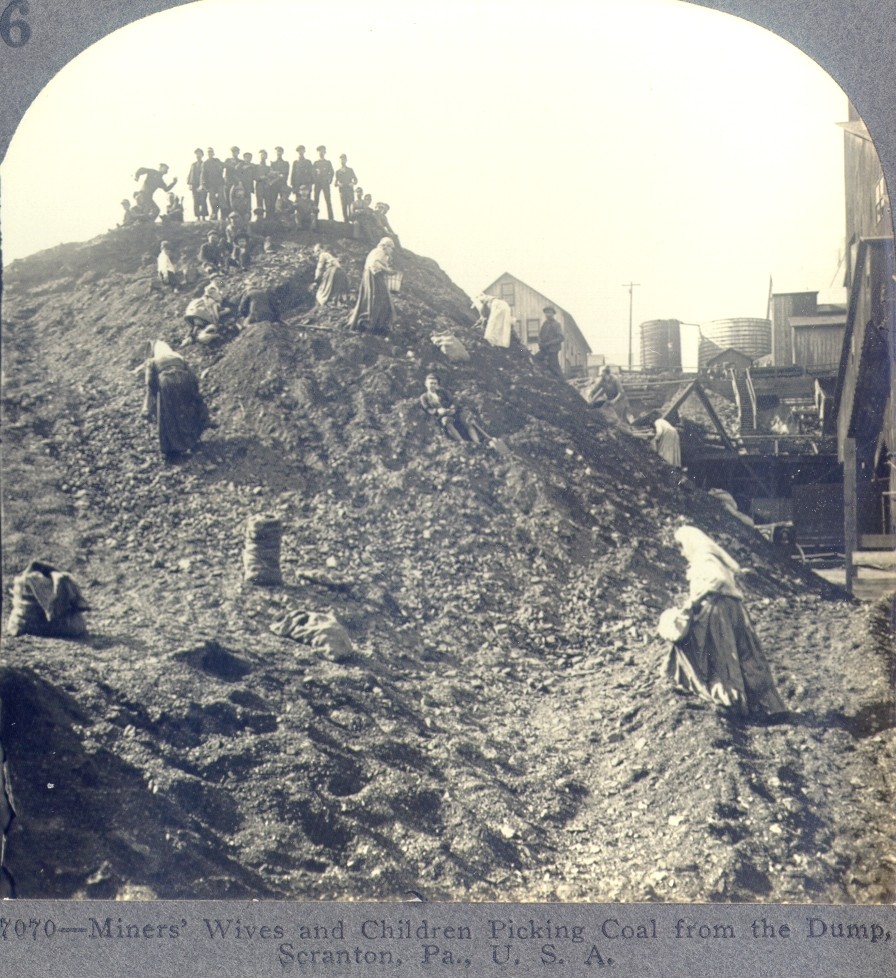 Wives & children at the dump