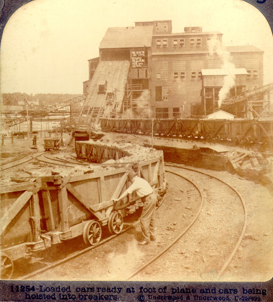 Cars being hoisted into breaker